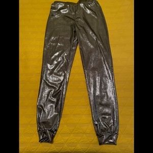 Shiny Stretchy joggers. Larger in size